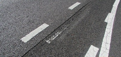 A mis-painted bike lane had to be milled, resulting in uneven pavement for cyclists